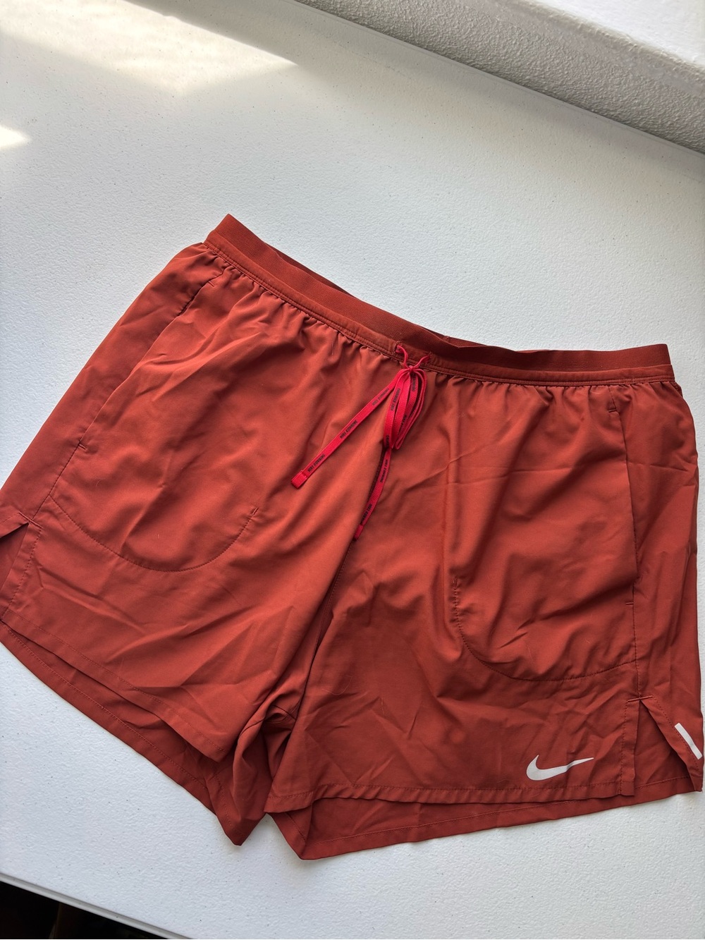 Nike Burnt Orange Running Shorts with Red Drawstring